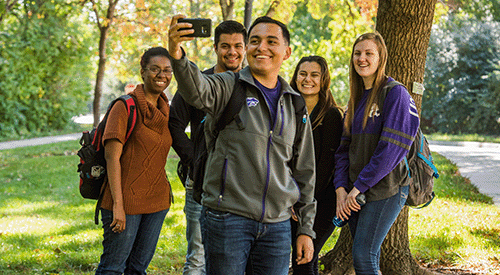 Students take a selfie.