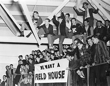 Students in the rafters of Nichols Gym petitioning for new field house in the 1940s