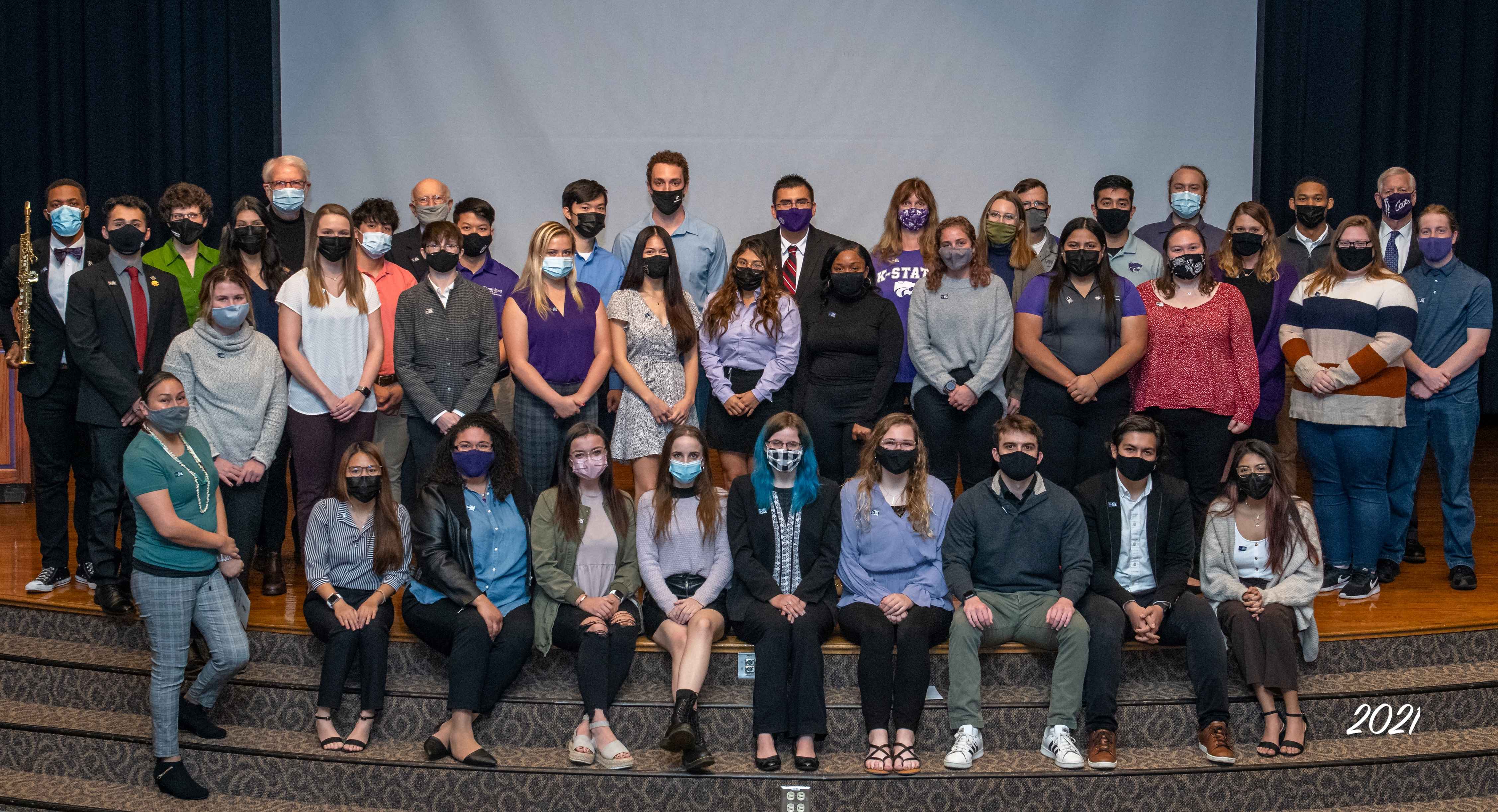 Large group of students wearing masks.