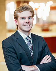 A student in a black blazer.