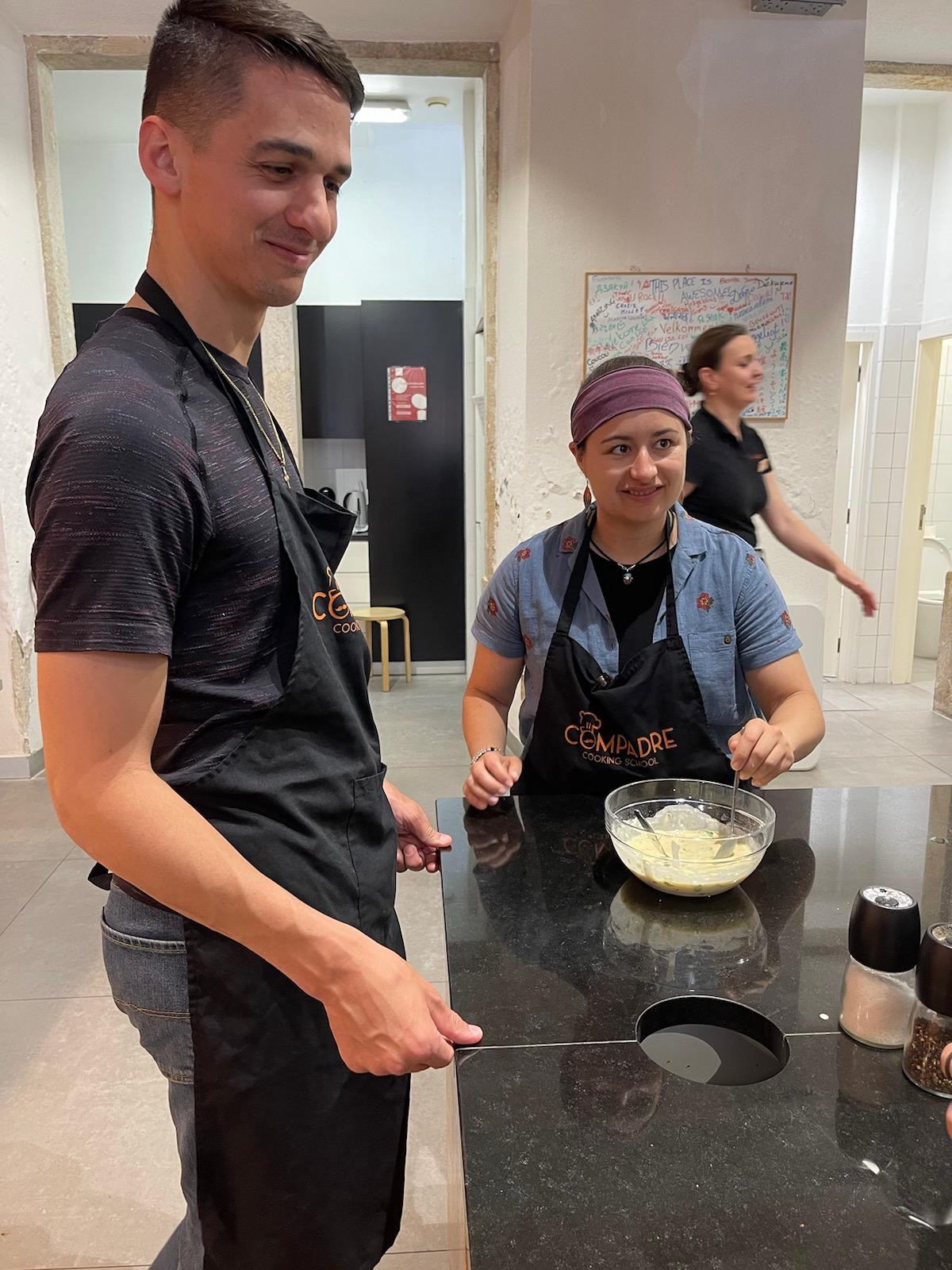 Theresa Penrod with her spouse at a cooking class. 