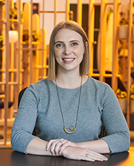 A woman in a gray shirt