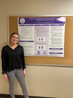sarah with research poster