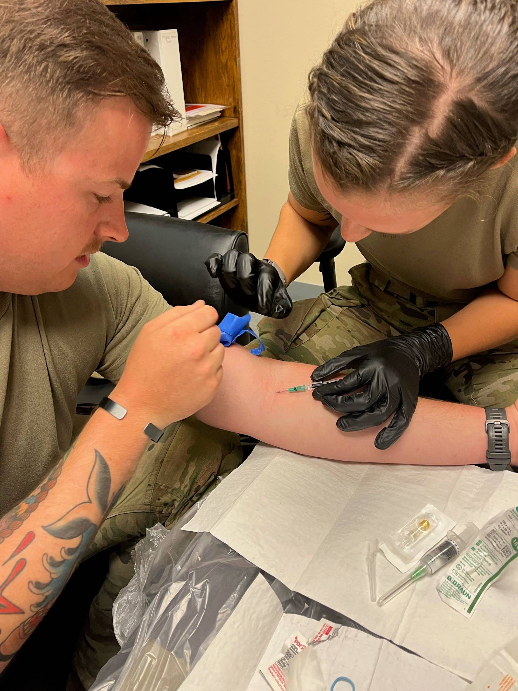 Cadet Snyder inserting IV