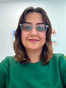 Susmita Rishi smiles for a portrait. 