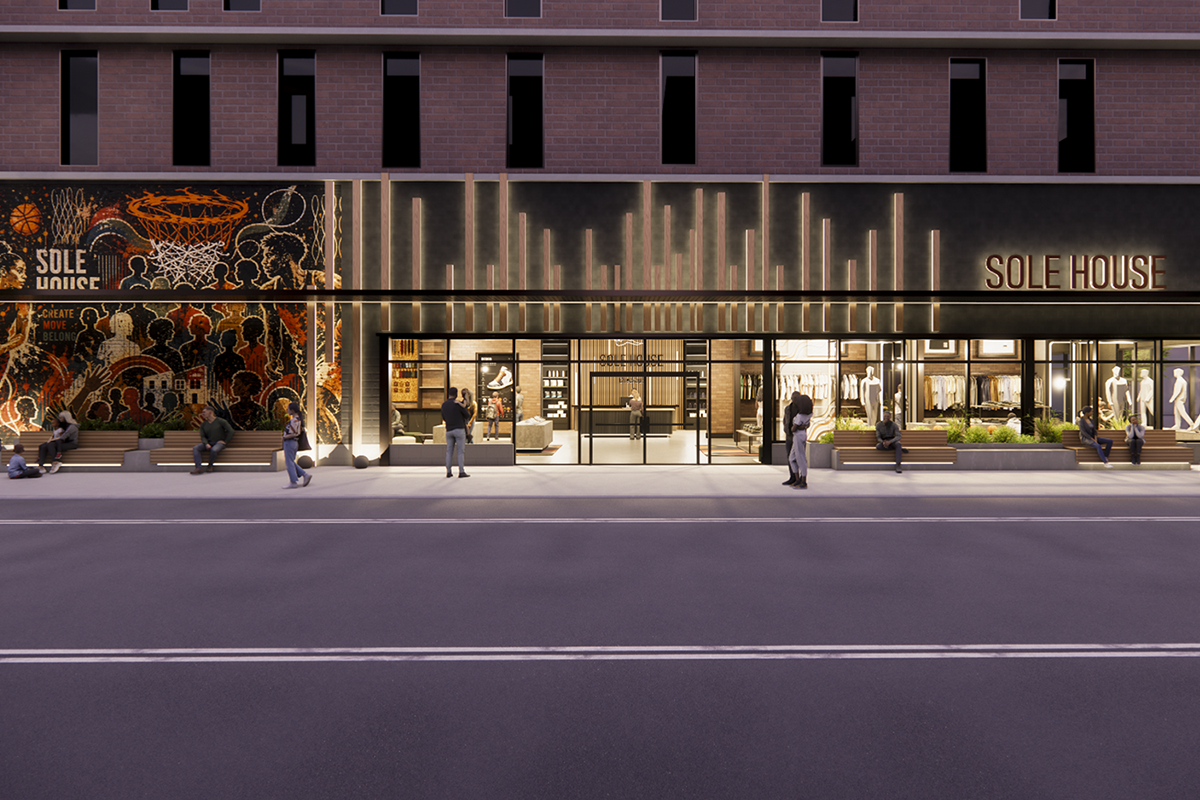 A rendering shows a brightly lit city storefront at night.