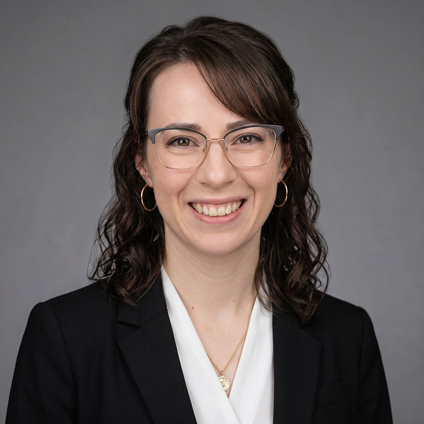 Sara Ray smiles for a professional portrait. 