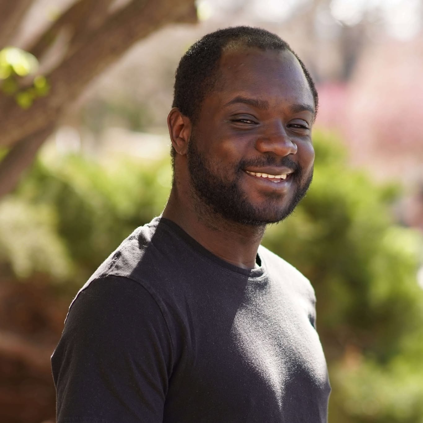 Festus smiles for a portrait 