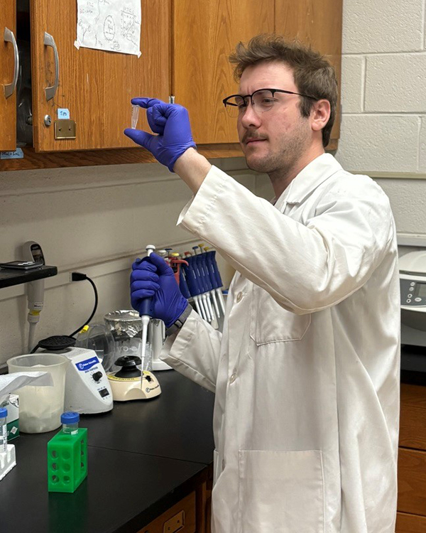 Sam Speck conducts genetic analysis of wild small mammals to help predict hot-spots for vector-borne disease