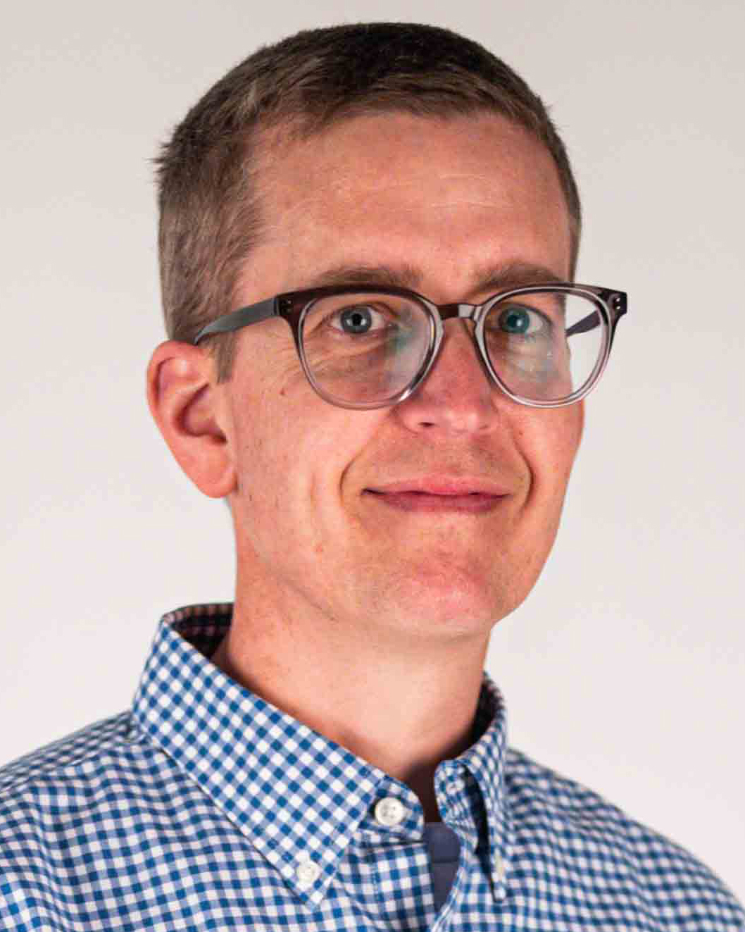 Matthew Kirk smiles for a portrait.