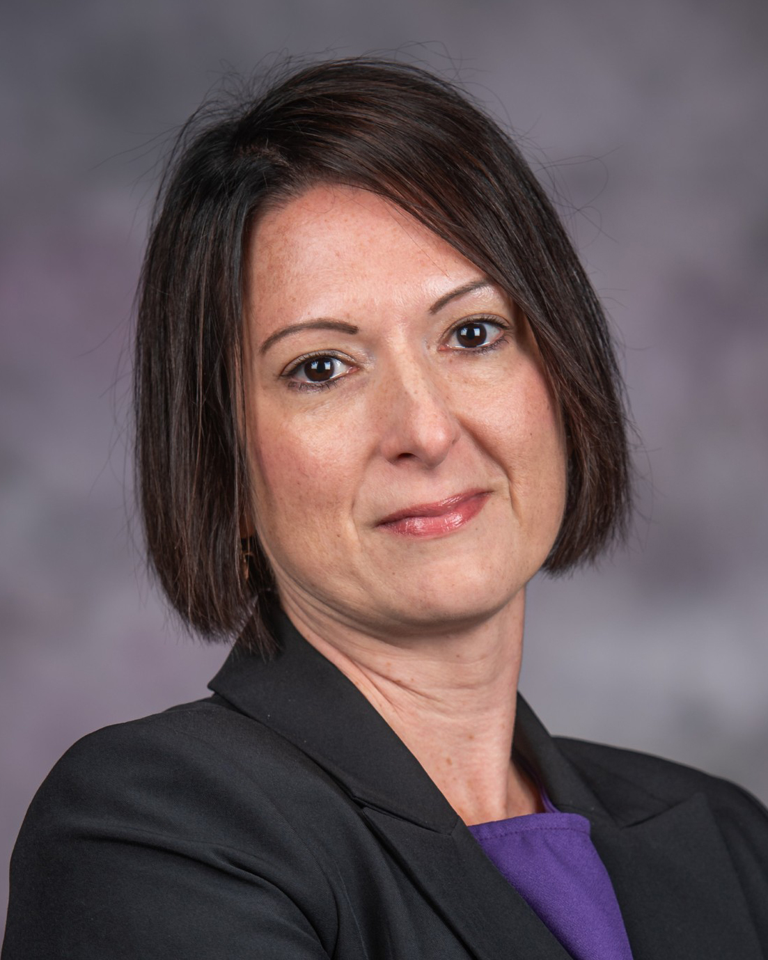 Valentina Trinetta smiles for a portrait.