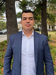 Allan Vieira de Castro Quadros A student wearing a suit.