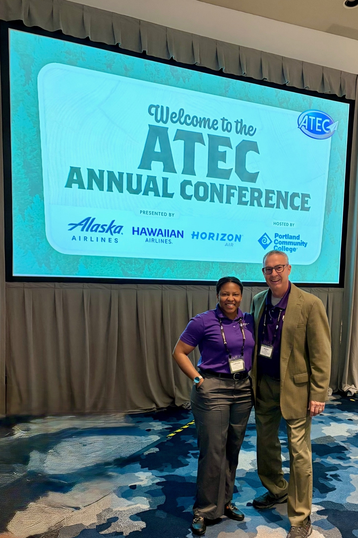 Smith and Clarke pose together at the ATEC conference