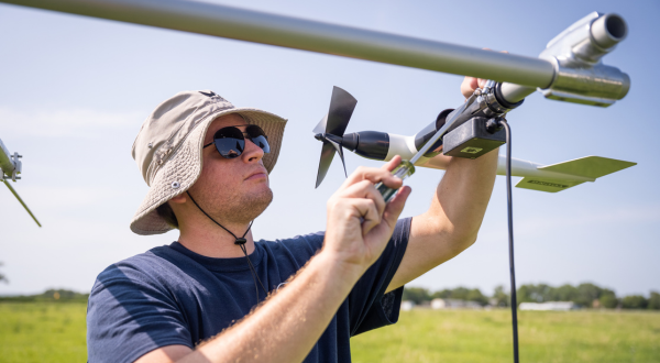 Researcher works on the Kansas Mesonet