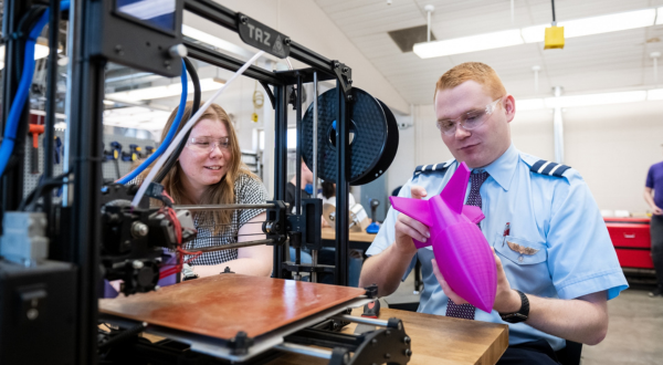 K-State Salina students 3D print a toy rocket.