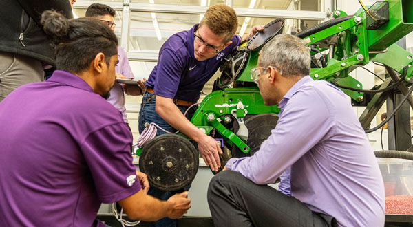 engineers looking at equipment