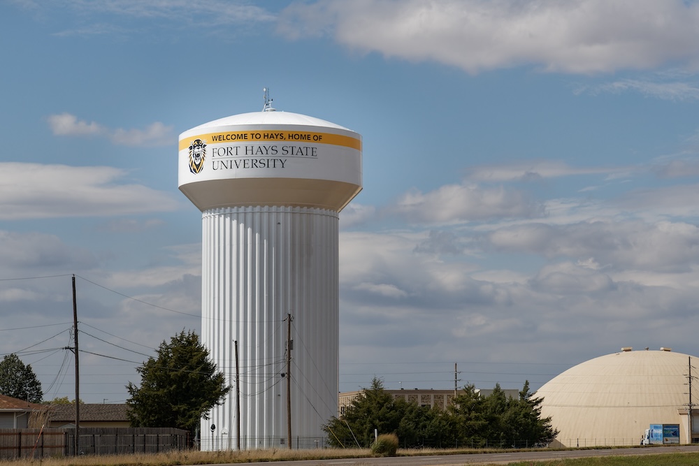 A view of the white Fort Hays State University water tower
