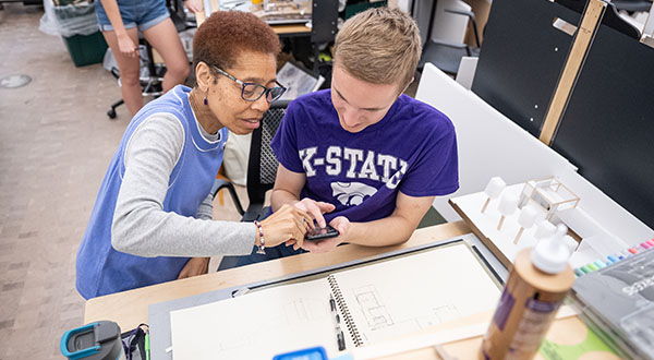 Architecture professor working with student