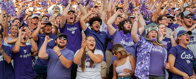 K-State students cheer on the football team in the student section