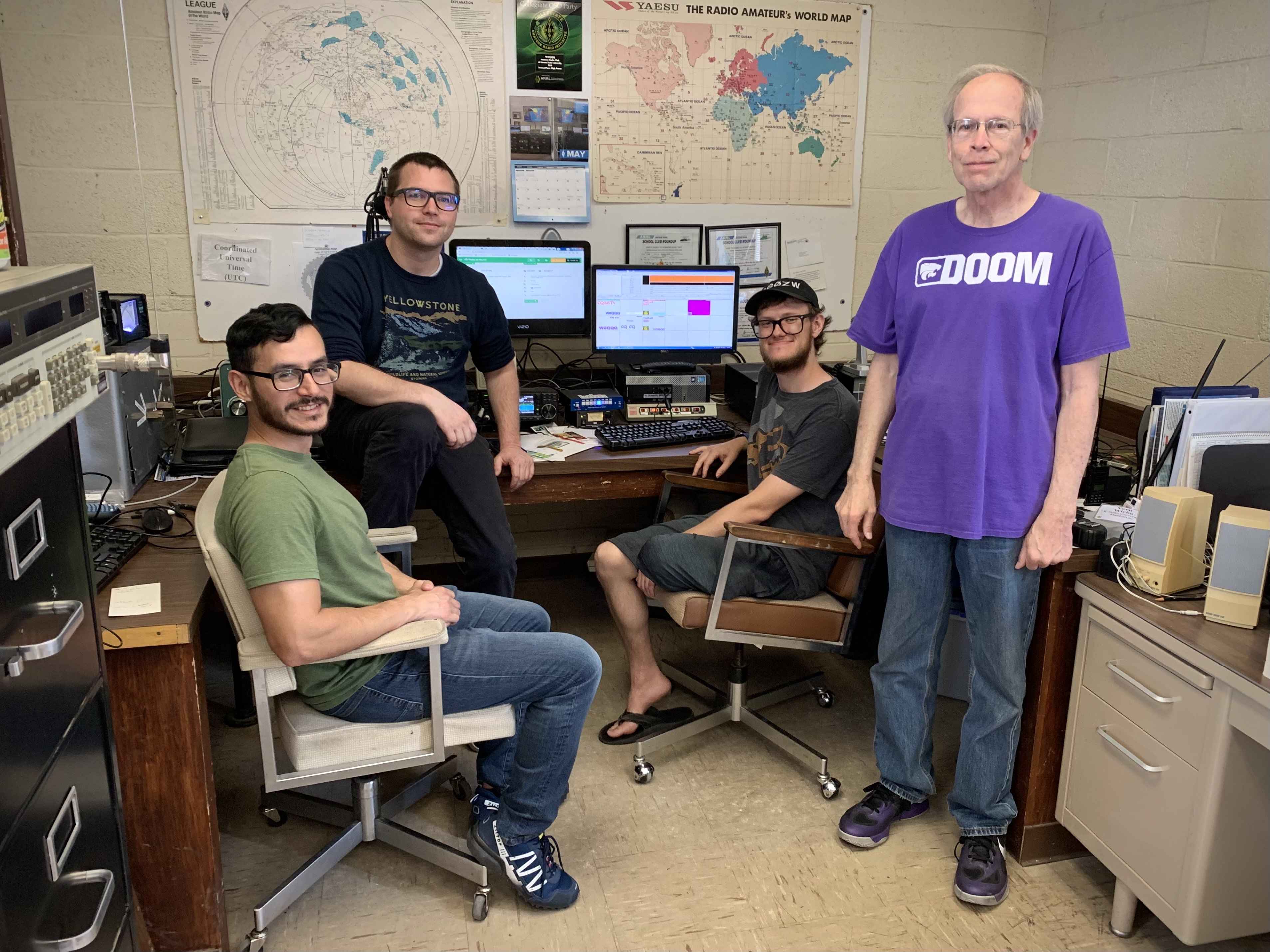 View of cllub station with several members posing